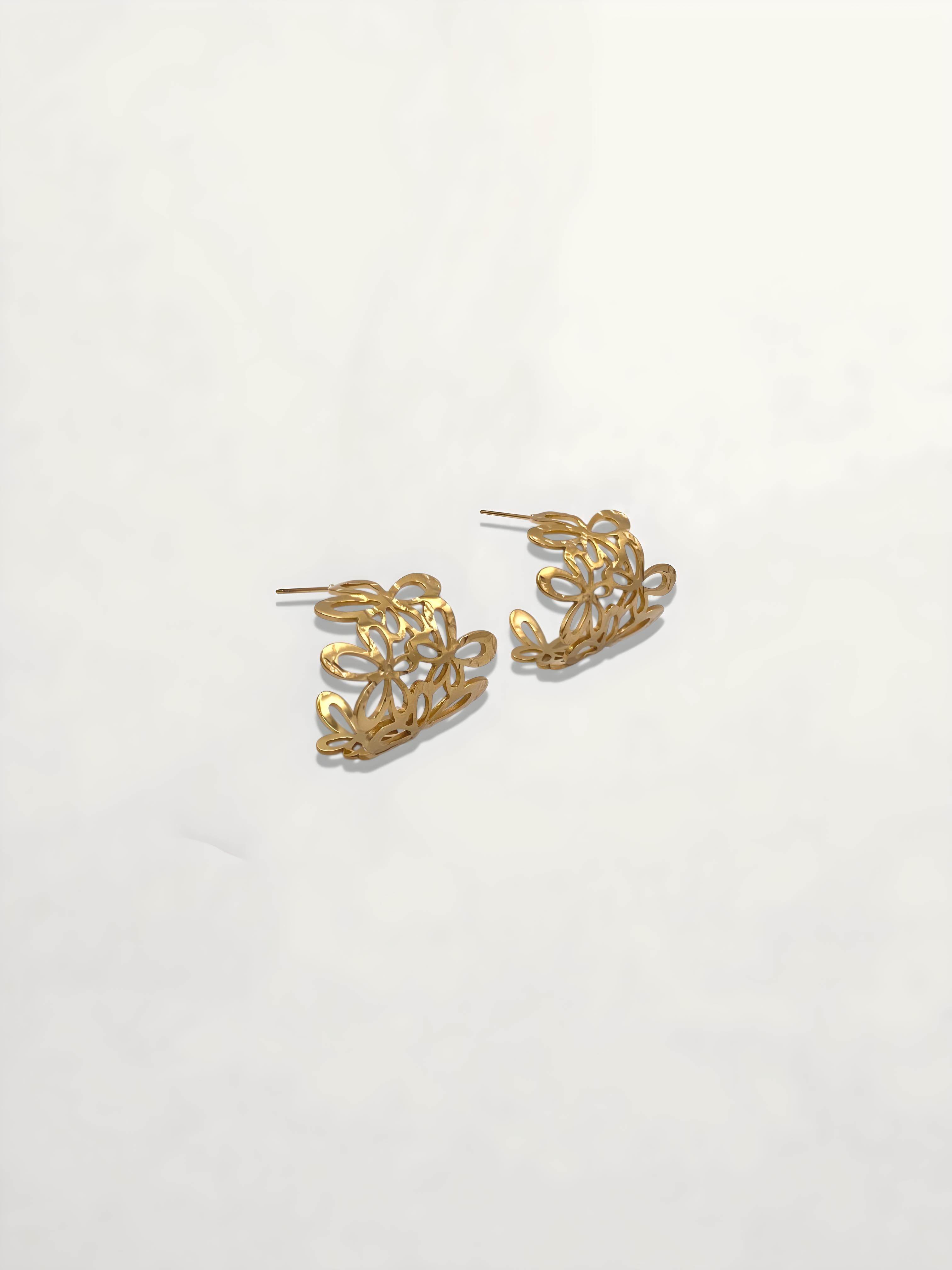 PENDIENTES AROS FLORES