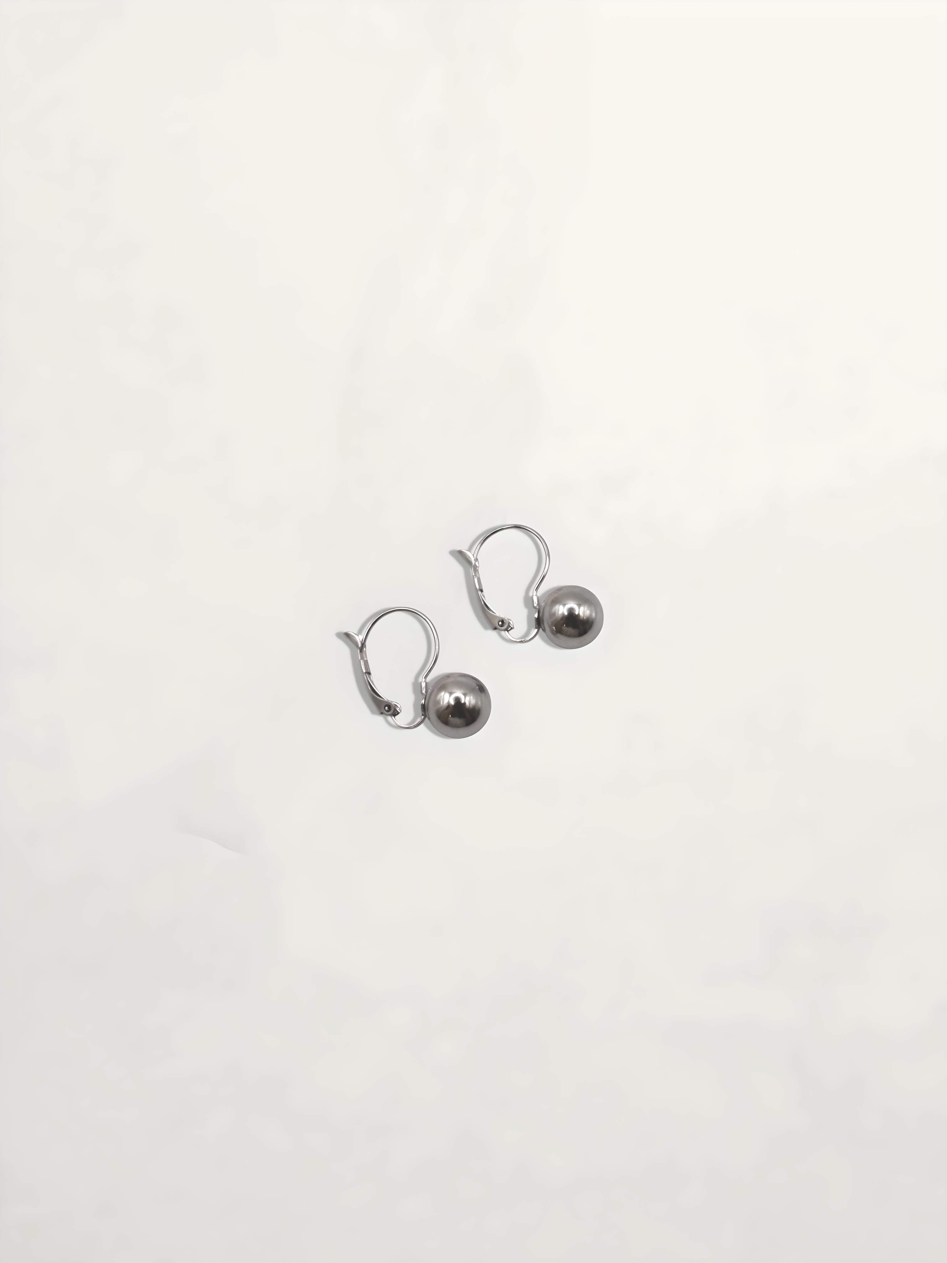 PENDIENTES PERLAS ACERO COLGANDO
